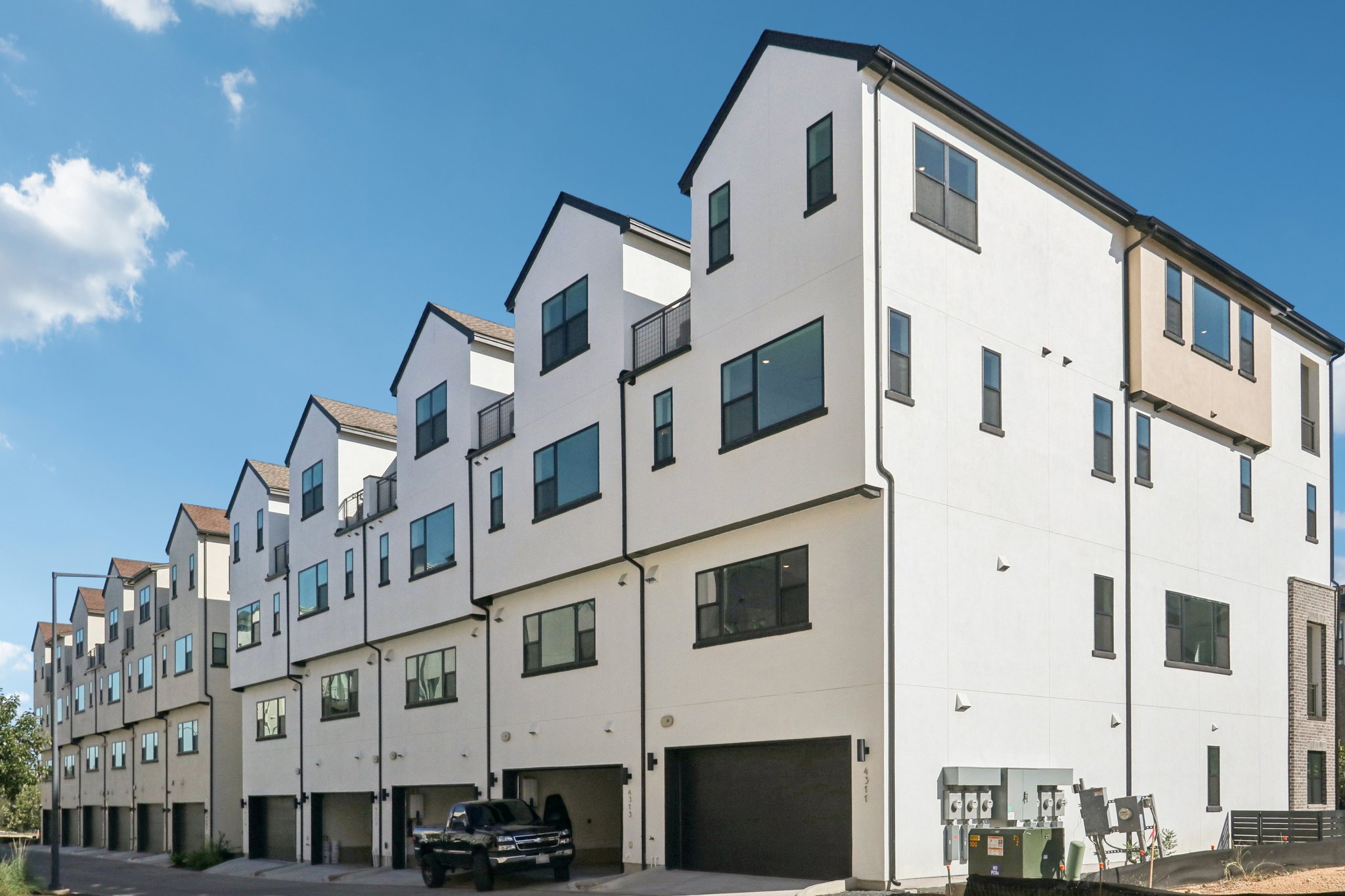 4311 Prevail Lane Austin, TX 78731 - Photo 29 of 40 a view of a white building with many windows