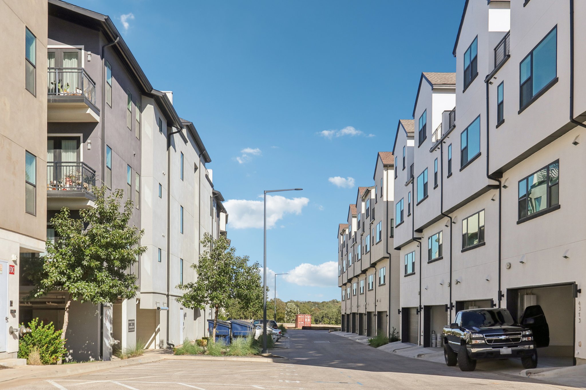 4311 Prevail Lane Austin, TX 78731 - Photo 30 of 40 a city street lined with buildings and cars
