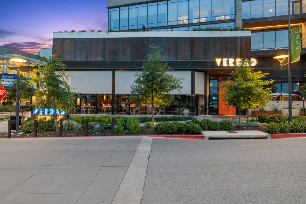 4311 Prevail Lane Austin, TX 78731 - Photo 33 of 40 a front view of a house with a yard and a garage