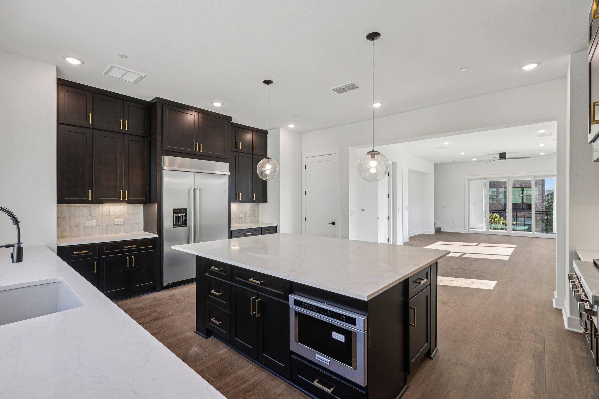 4311 Prevail Lane Austin, TX 78731 - Photo 5 of 40 a kitchen with a stove and a sink