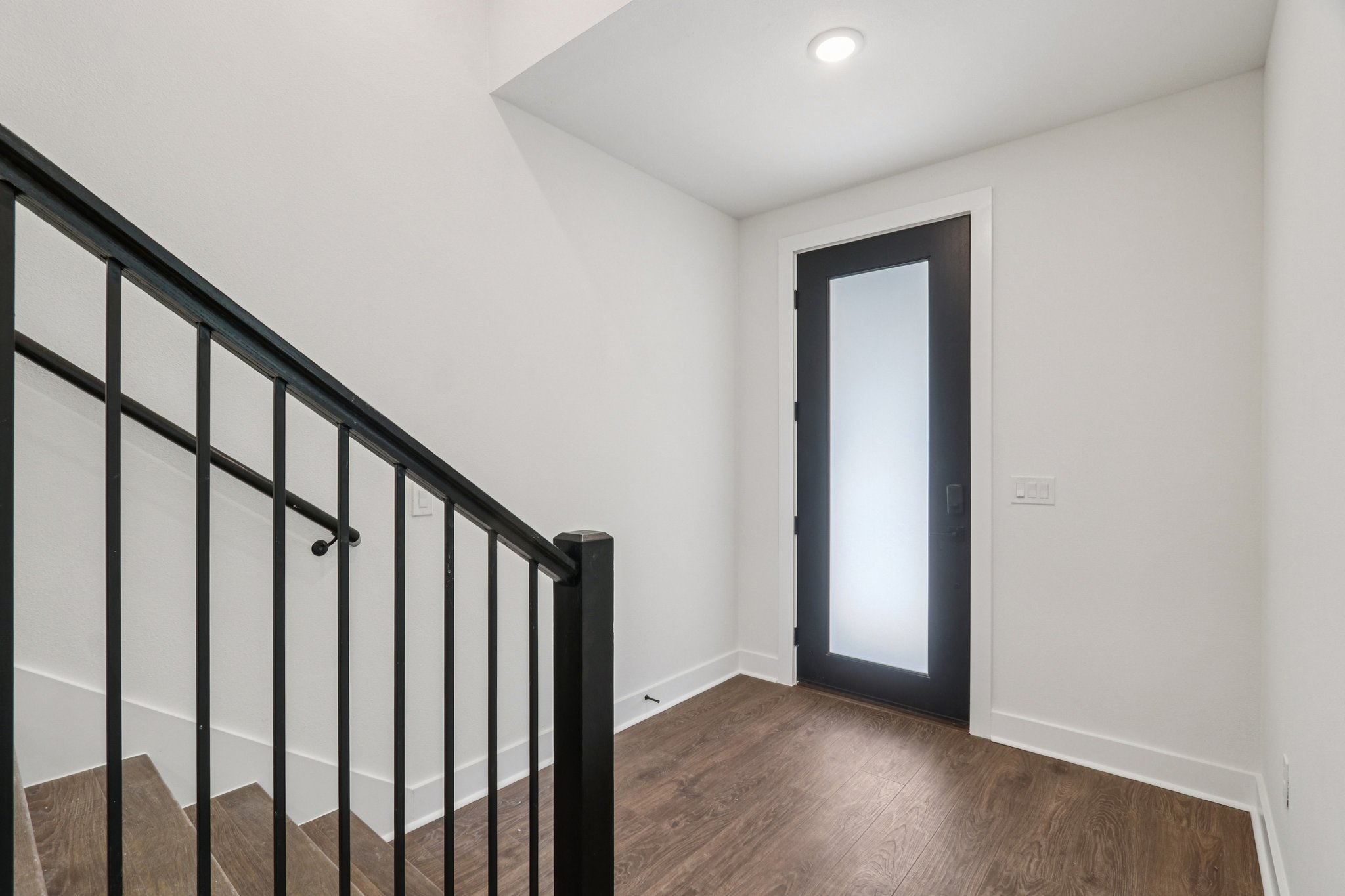 4311 Prevail Lane Austin, TX 78731 - Photo 10 of 40 a view of staircase with wooden floor