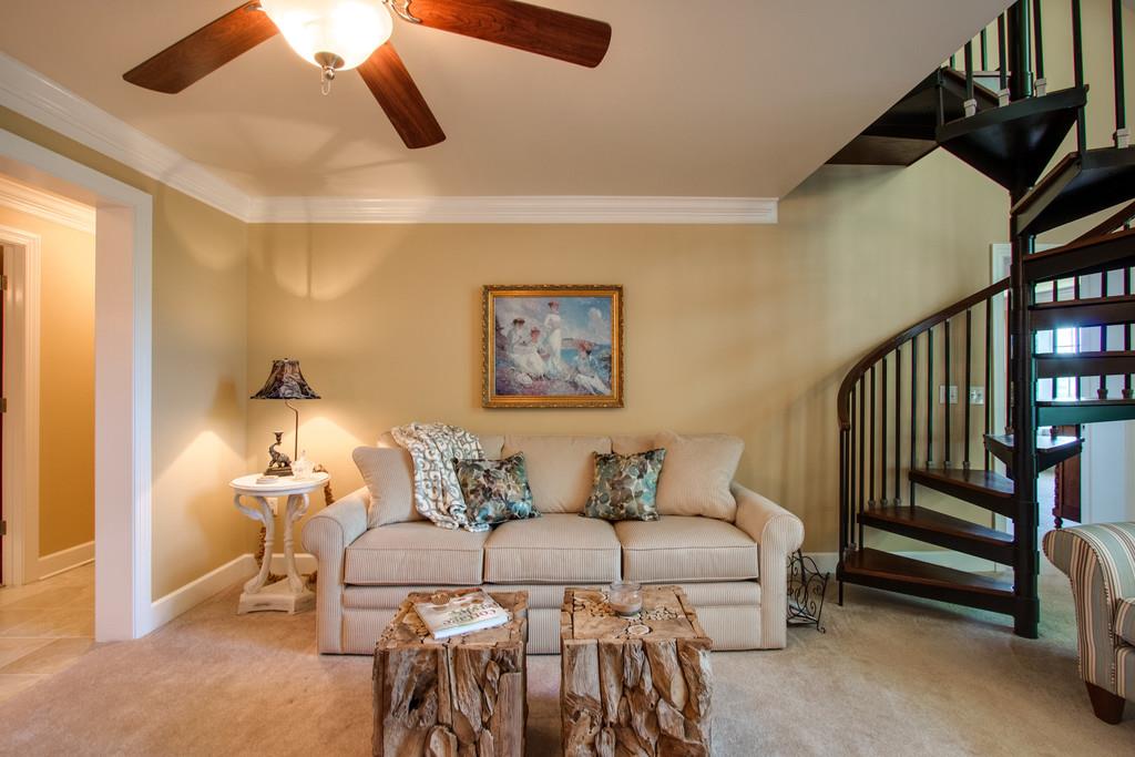 7100 Dale Ridge Road, Unit K6 Lancaster, TN 38569 - Photo 4 of 30 Charming living area also has spiral staircase up to the loft!