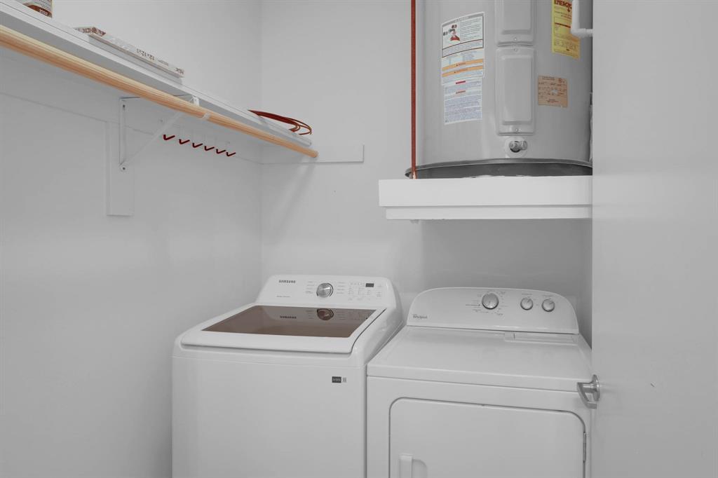 4333 Gilbert Avenue, Unit 215 Dallas, TX 75219 - Photo 15 of 19 a utility room with dryer and washer