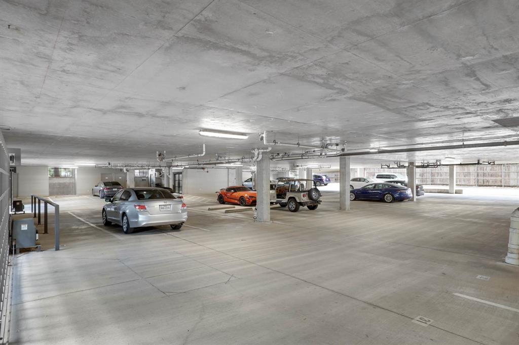 4333 Gilbert Avenue, Unit 215 Dallas, TX 75219 - Photo 17 of 19 a view of parking area with parked cars