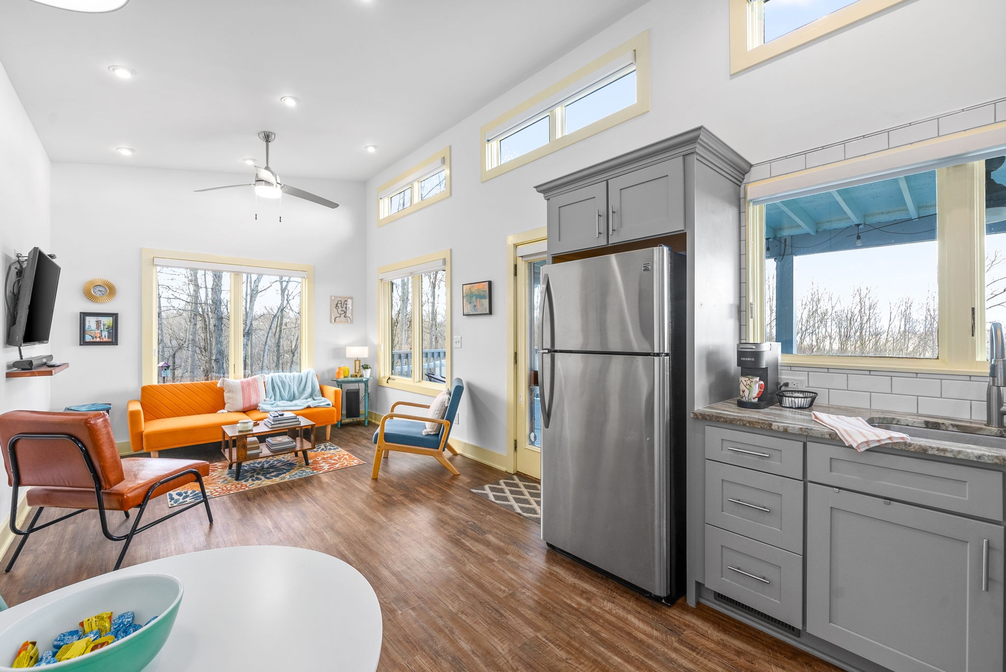 1166 Dale Ridge Road Dowelltown, TN 37059 - Photo 11 of 69 a kitchen with stainless steel appliances granite countertop a refrigerator a sink dishwasher a dining table and chairs with wooden floor