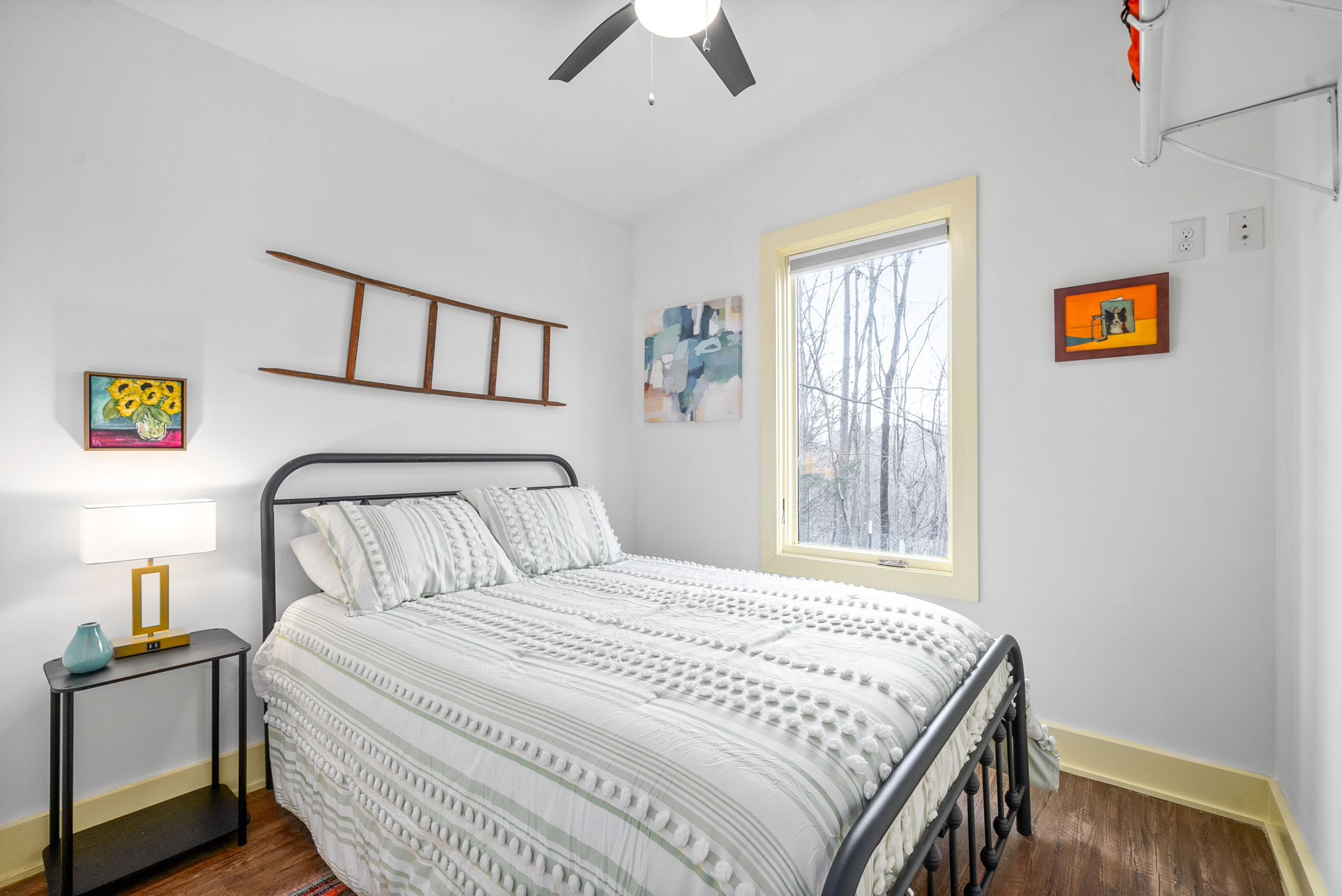1166 Dale Ridge Road Dowelltown, TN 37059 - Photo 12 of 69 a bedroom with a bed and a painting on the wall