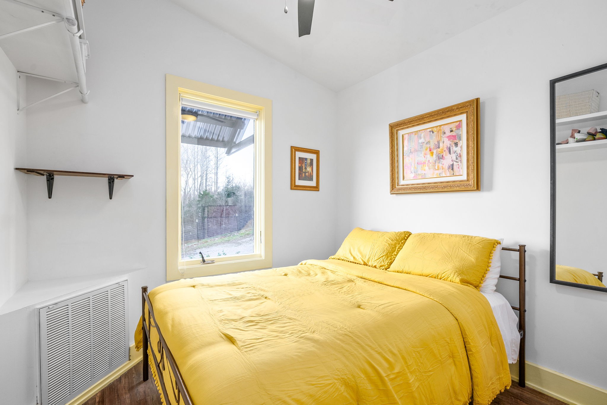 1166 Dale Ridge Road Dowelltown, TN 37059 - Photo 15 of 69 a bedroom with a bed and wooden floor