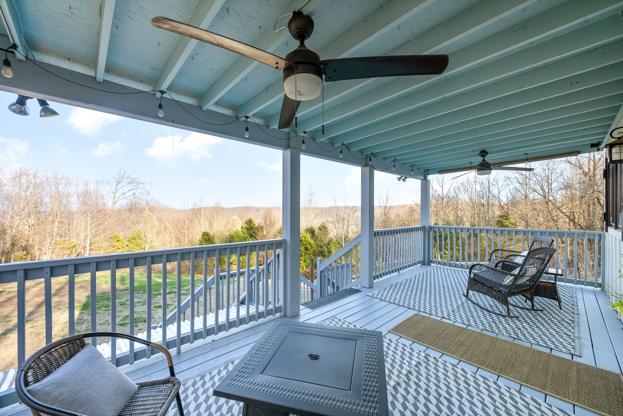 1166 Dale Ridge Road Dowelltown, TN 37059 - Photo 3 of 69 a view of a patio with a table chairs and a patio