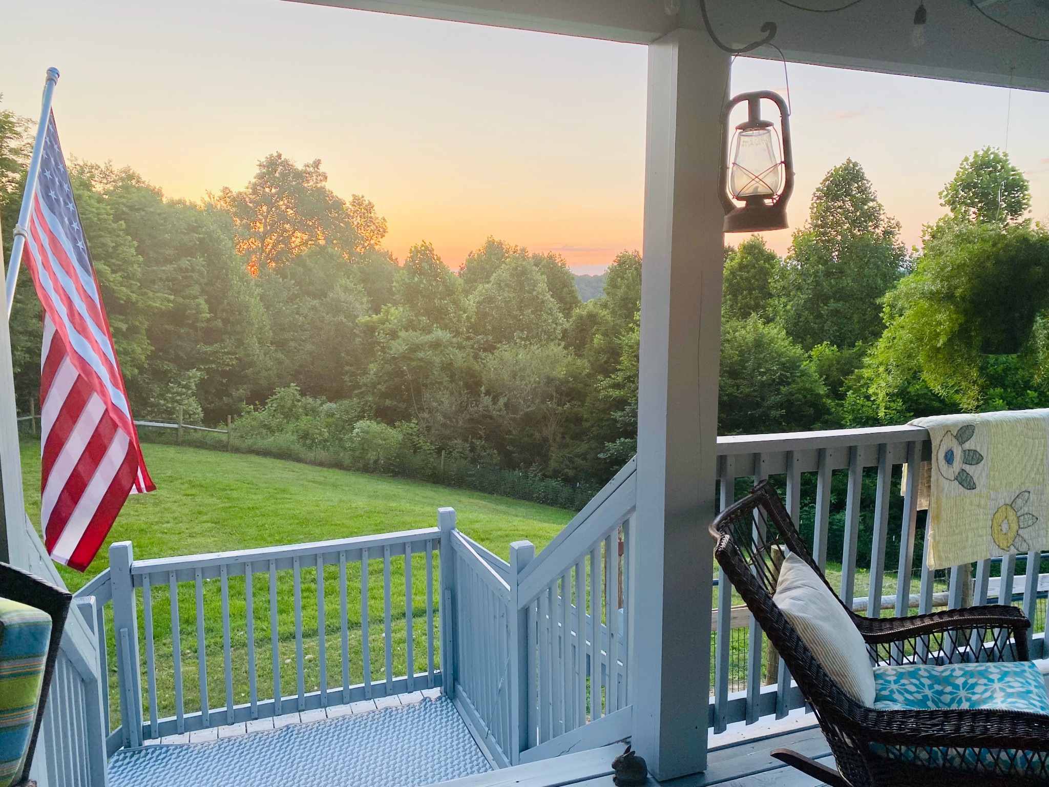 1166 Dale Ridge Road Dowelltown, TN 37059 - Photo 48 of 69 a view of a deck with a floor to ceiling window and wooden fence