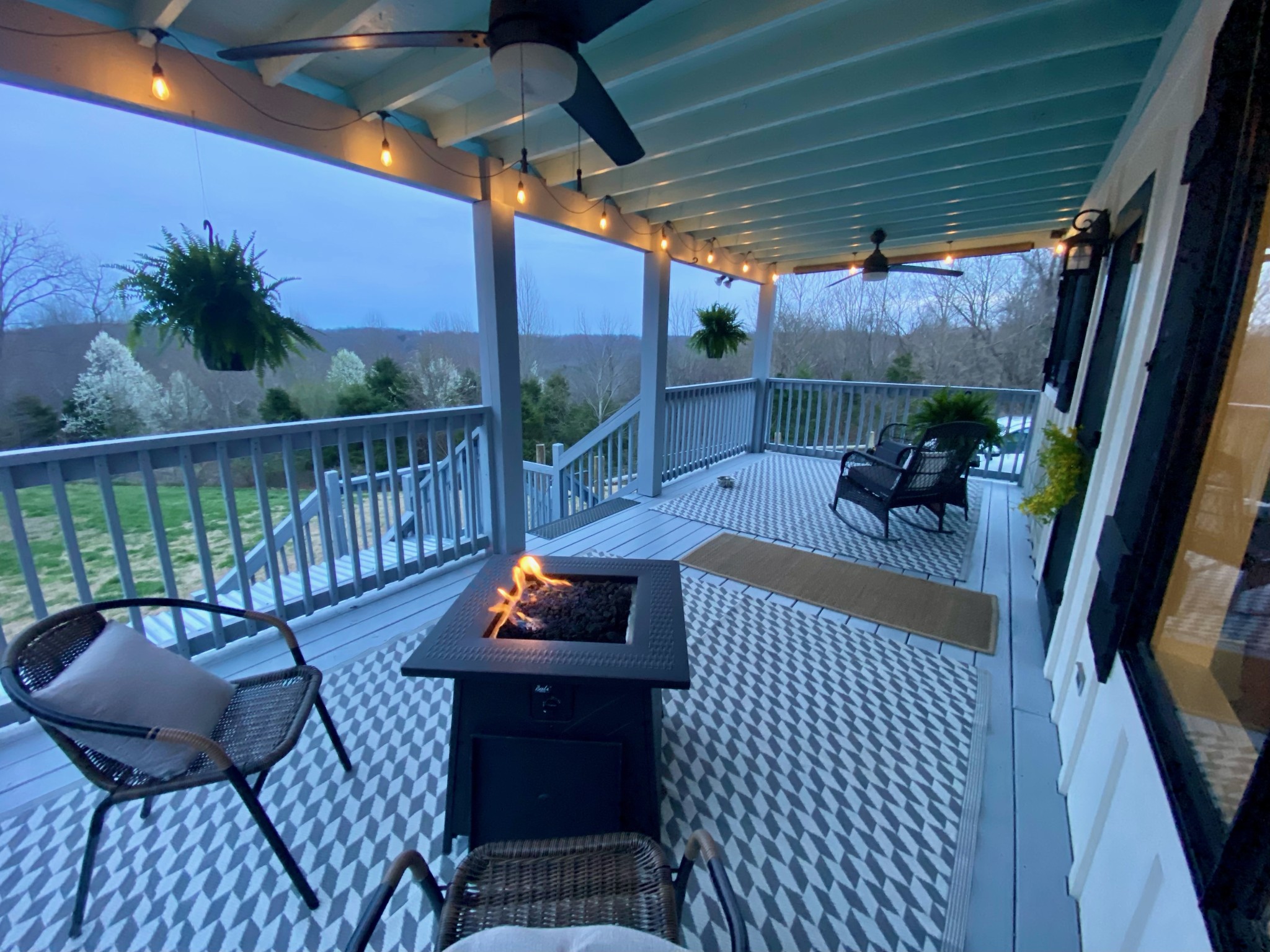 1166 Dale Ridge Road Dowelltown, TN 37059 - Photo 52 of 69 a view of a patio with a table chairs and a barbeque