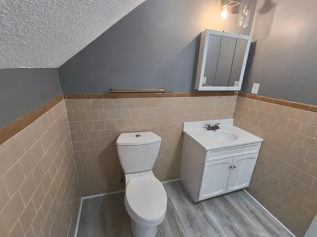 a bathroom with a sink and a toilet