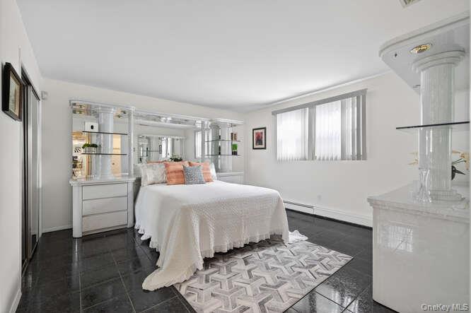 1075 Olympia Road North Bellmore, NY 11710 - Photo 13 of 23 Extra large sun filled primary bedroom