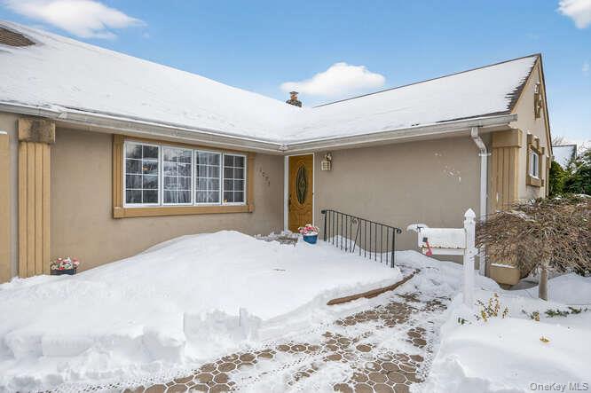 1075 Olympia Road North Bellmore, NY 11710 - Photo 2 of 23 Stucco Exterior