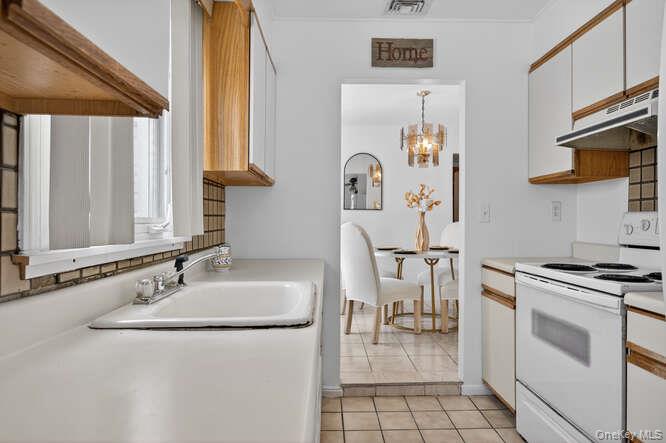 1075 Olympia Road North Bellmore, NY 11710 - Photo 8 of 23 Kitchen to Dining Room space