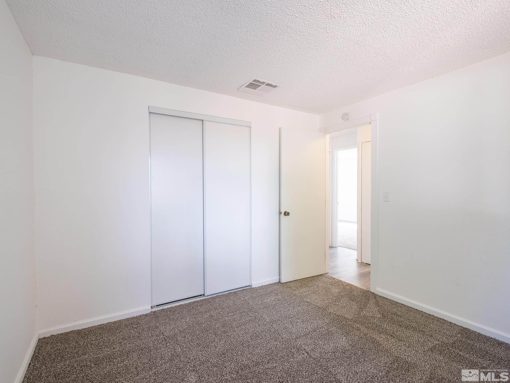 15025 Perlite Drive Reno, NV 89521 - Photo 12 of 24 a view of an empty room