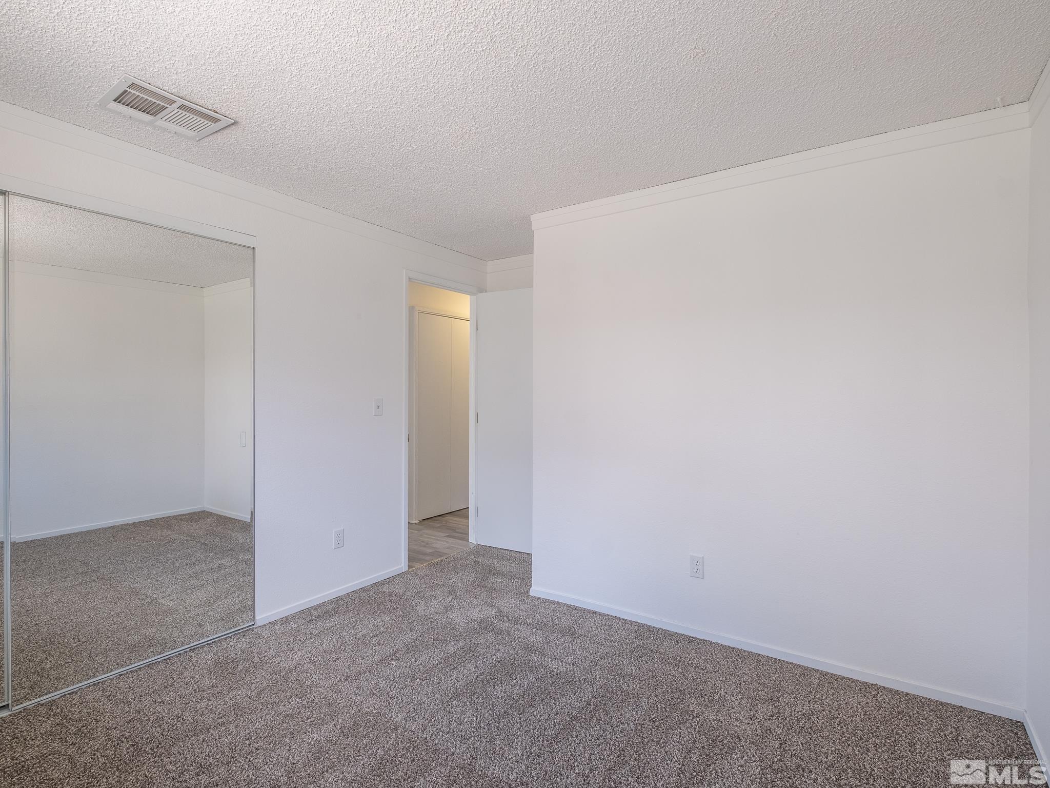 15025 Perlite Drive Reno, NV 89521 - Photo 14 of 24 a view of an empty room