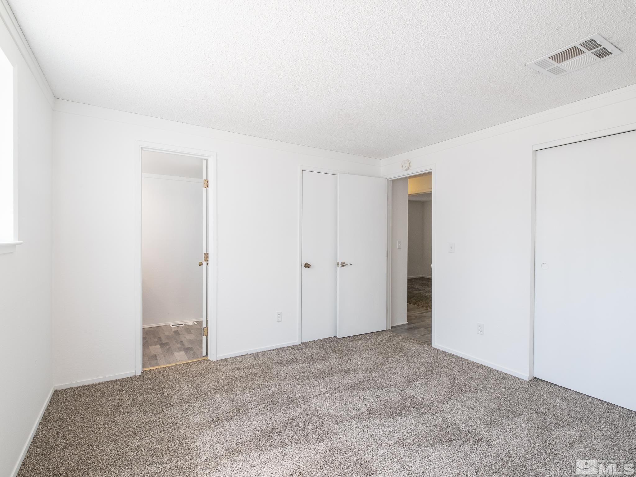 15025 Perlite Drive Reno, NV 89521 - Photo 15 of 24 a view of an empty room