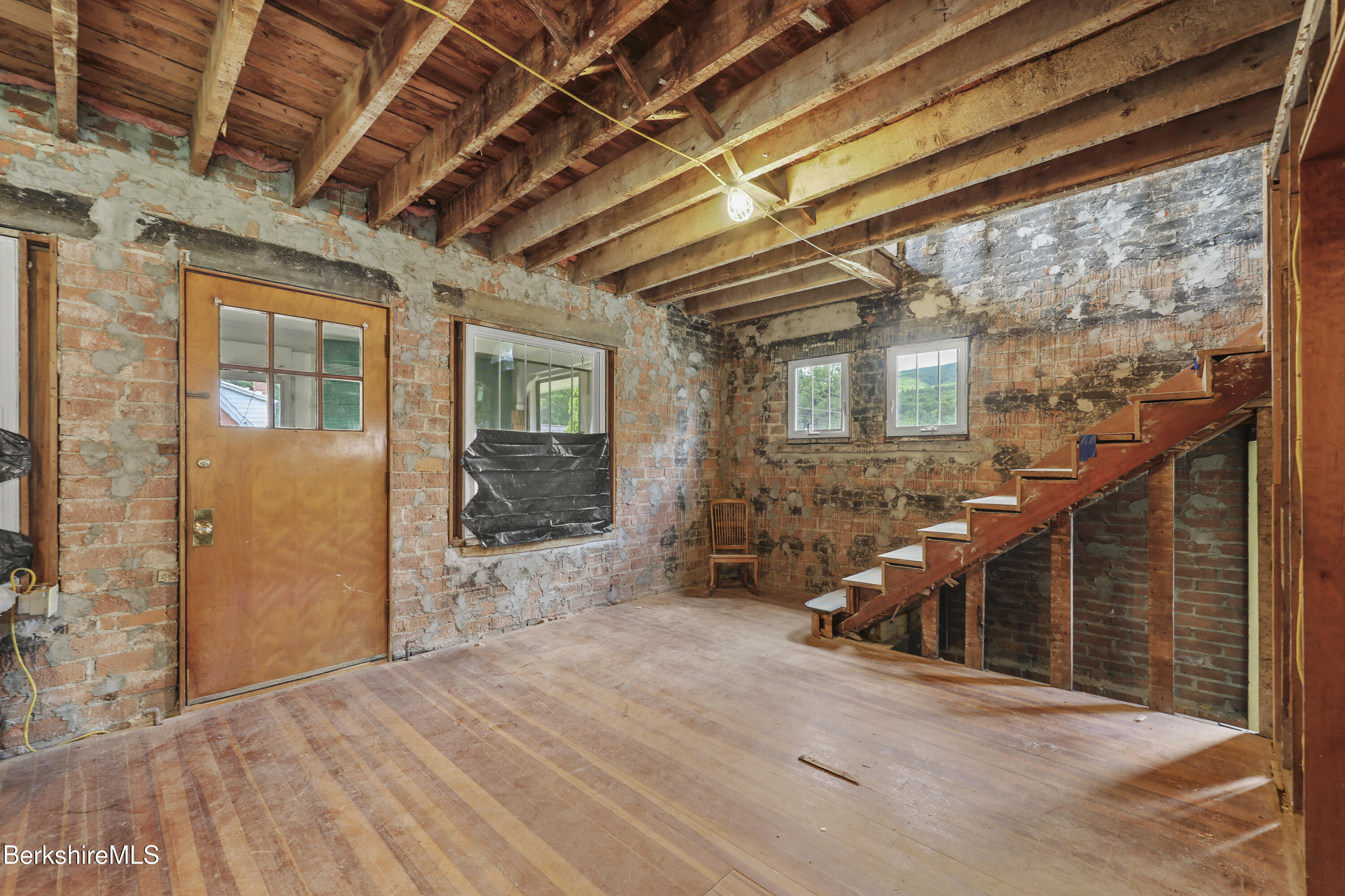 84 Notch Road North Adams, MA 01247 - Photo 5 of 30 a view of a porch with wooden floor and windows