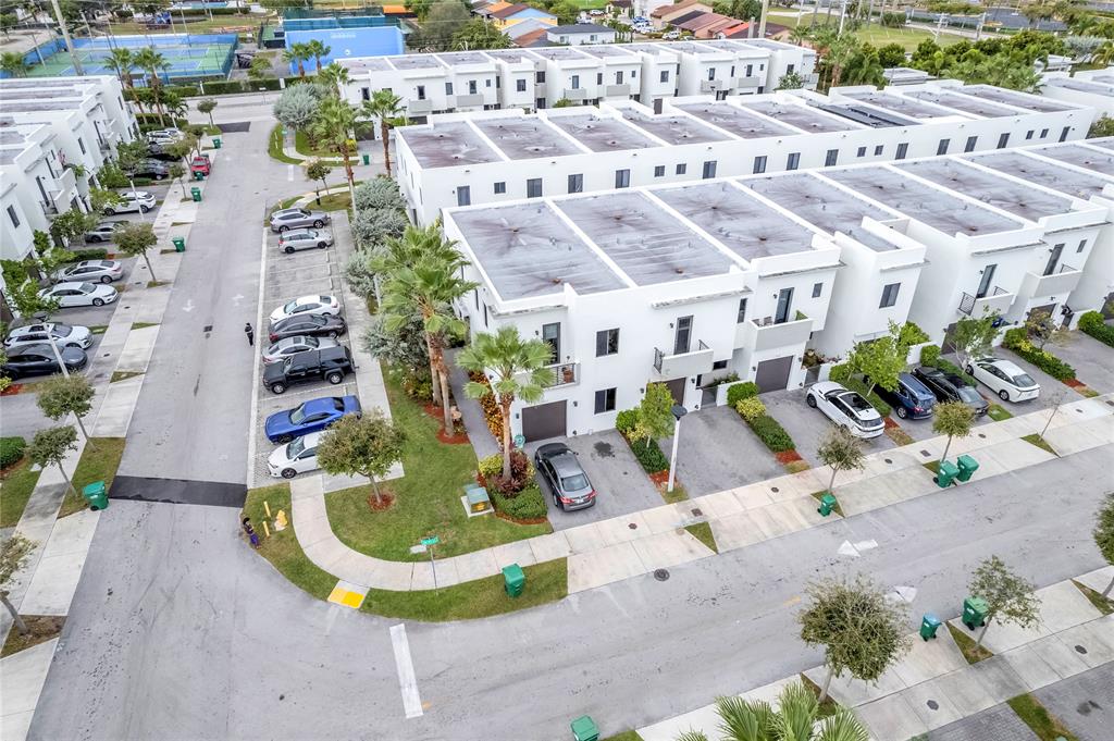 542 Southwest 91st Court, Unit 542 Miami, FL 33174 - Photo 31 of 33 a view of a swimming pool with outdoor seating space