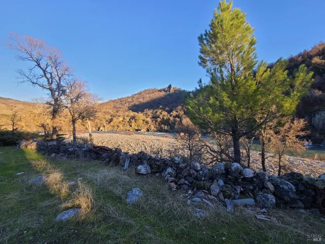a view of lake with green space