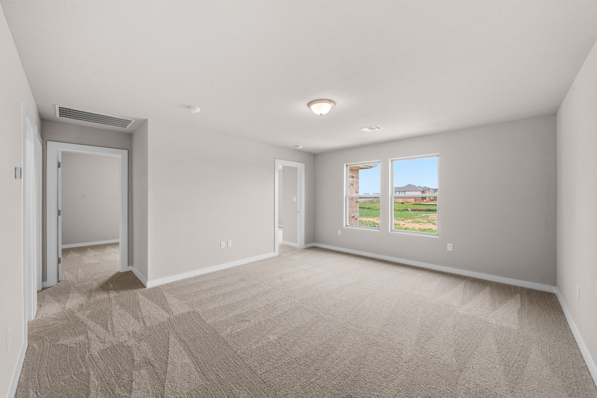 25517 Ashton Look Drive Elgin, TX 78621 - Photo 21 of 34 a view of an empty room with a window