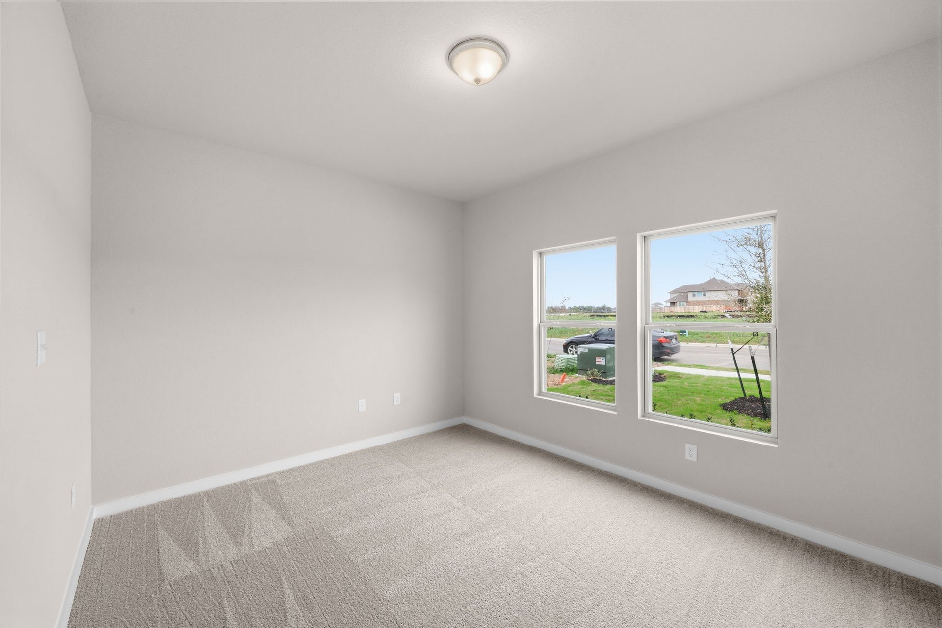 25517 Ashton Look Drive Elgin, TX 78621 - Photo 23 of 34 an empty room with windows