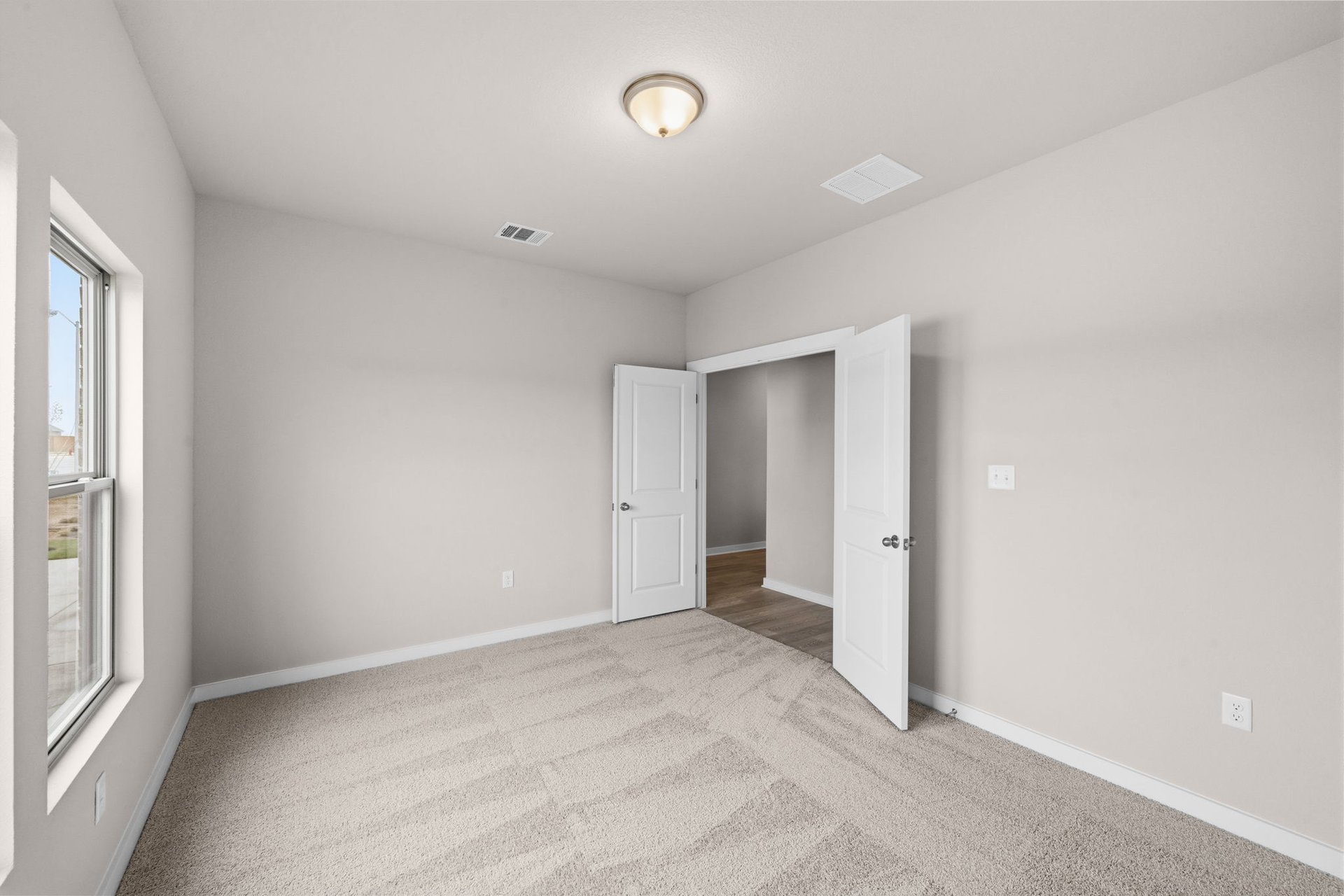 25517 Ashton Look Drive Elgin, TX 78621 - Photo 24 of 34 a view of an empty room with a window