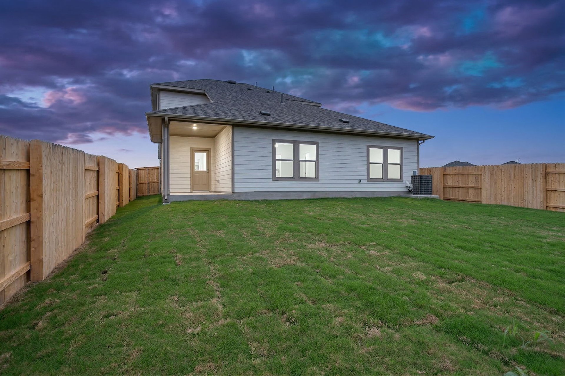 25517 Ashton Look Drive Elgin, TX 78621 - Photo 26 of 34 a brick house with a yard
