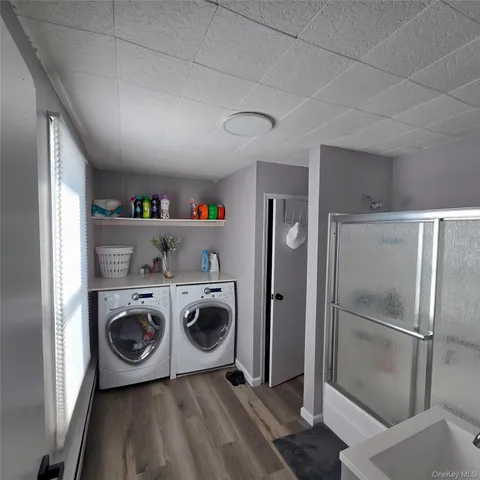 a utility room with dryer and washer