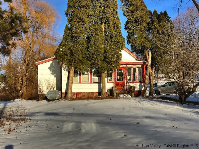 448 Fosler Road Wallkill, NY 12589 - Photo 2 of 8 a view of a parked cars in front of a building