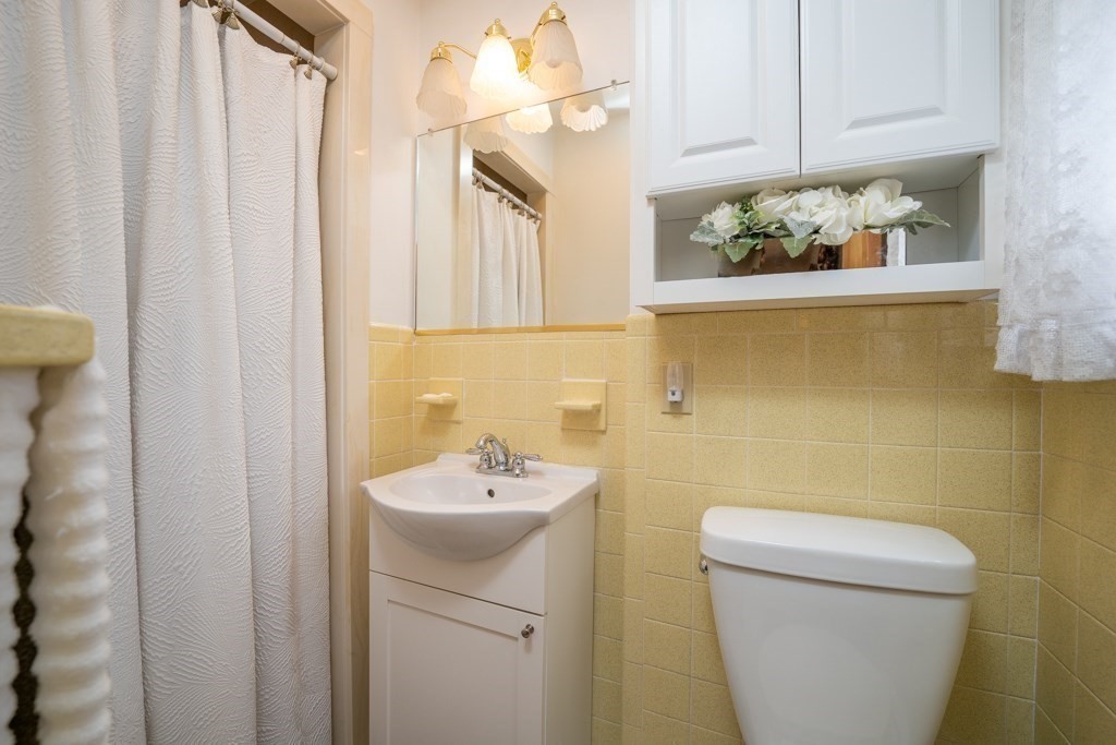 178 West Autumn Road West Springfield, MA 01089 - Photo 15 of 38 a bathroom with a sink a toilet and shower curtain