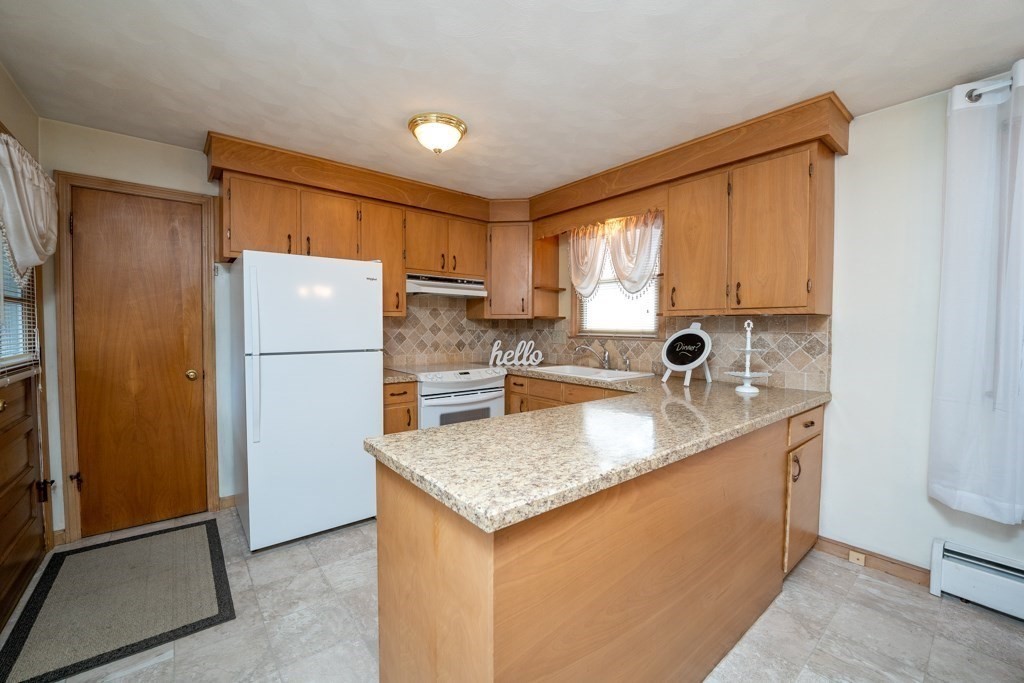 178 West Autumn Road West Springfield, MA 01089 - Photo 5 of 38 a kitchen with refrigerator cabinets and a sink