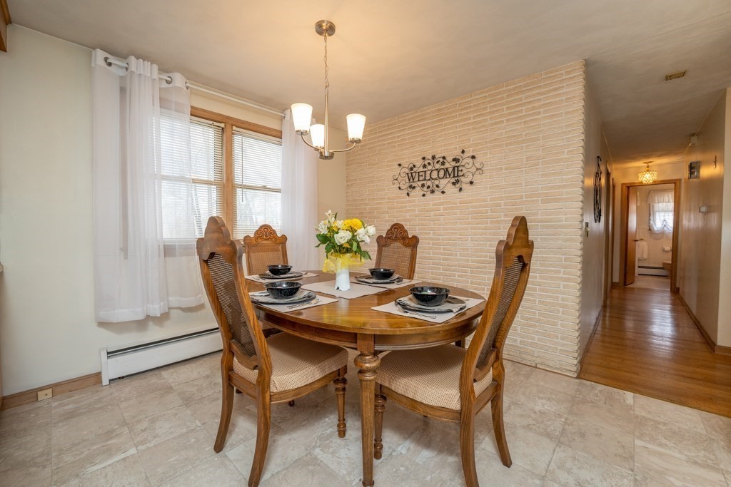 178 West Autumn Road West Springfield, MA 01089 - Photo 7 of 38 a view of a dining room with furniture window and wooden floor
