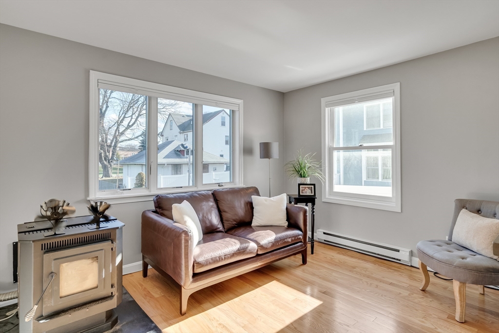 7 Long Terrace Boston, MA 02132 - Photo 18 of 42 a living room with furniture and a window