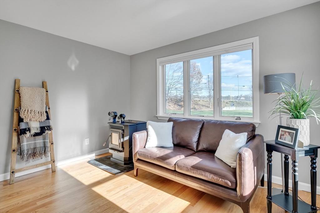 7 Long Terrace Boston, MA 02132 - Photo 19 of 42 a living room with furniture and a window