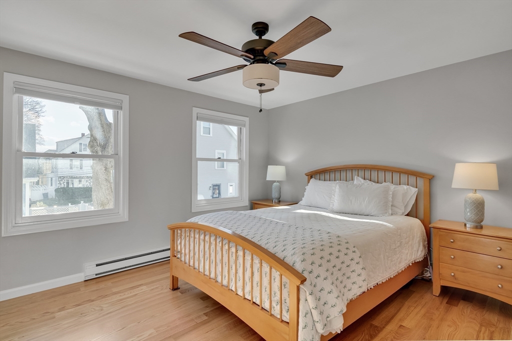 7 Long Terrace Boston, MA 02132 - Photo 25 of 42 a bedroom with a bed and window