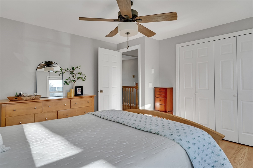7 Long Terrace Boston, MA 02132 - Photo 28 of 42 a bedroom with a large bed and dresser