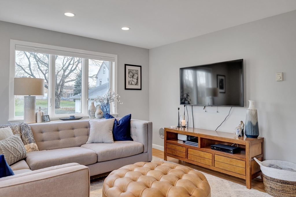 7 Long Terrace Boston, MA 02132 - Photo 4 of 42 a living room with furniture and a flat screen tv
