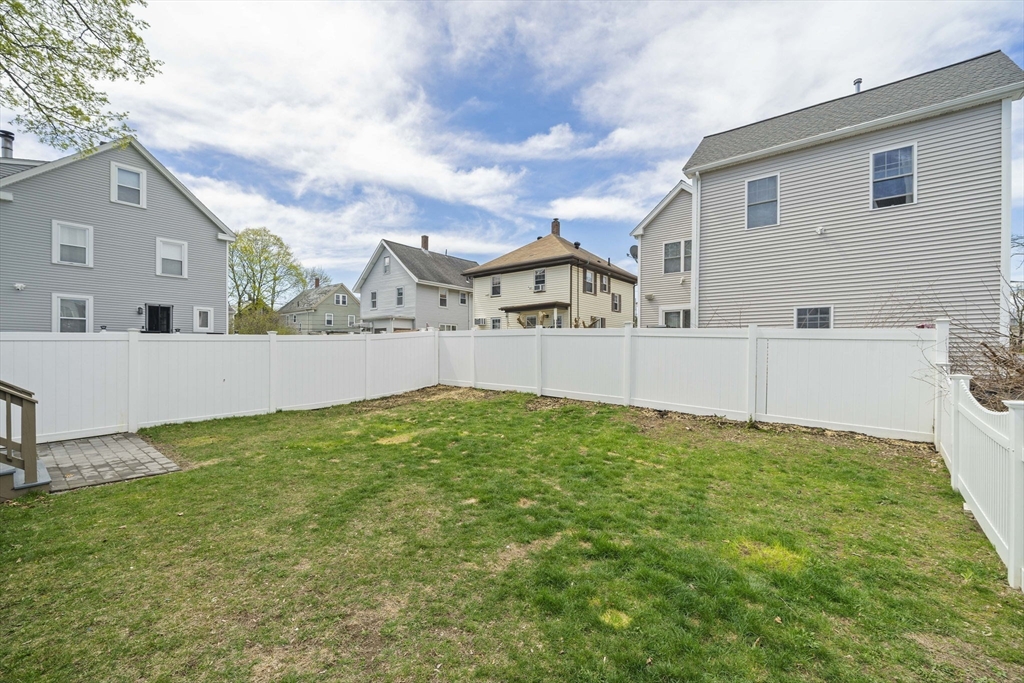 7 Long Terrace Boston, MA 02132 - Photo 41 of 42 front view of a house with a yard