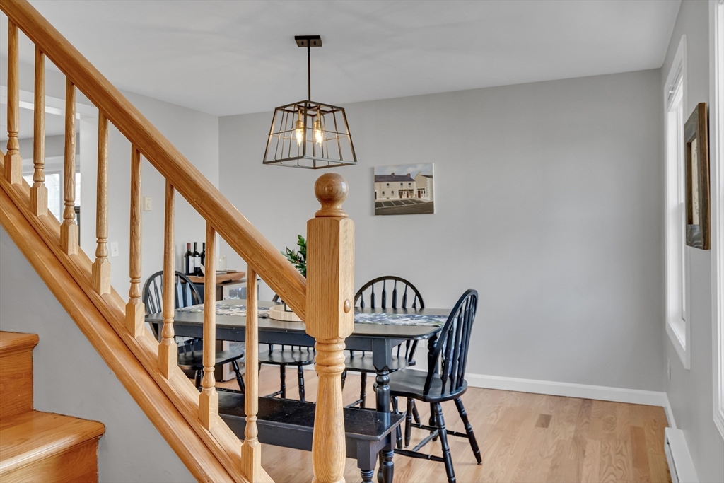 7 Long Terrace Boston, MA 02132 - Photo 9 of 42 a view of a hallway with wooden floor and stairs