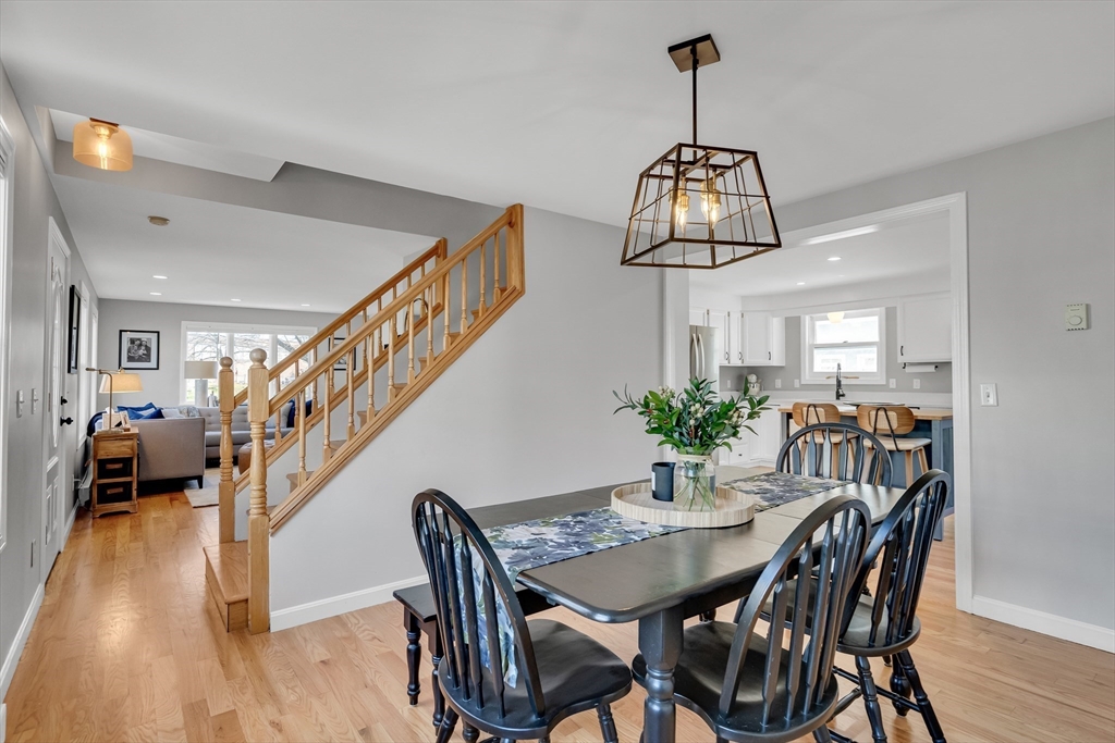 7 Long Terrace Boston, MA 02132 - Photo 10 of 42 a view of a dining room with furniture wooden floor and chandelier