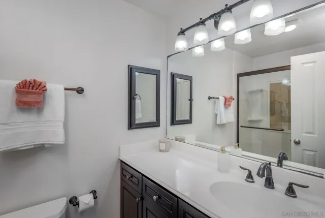 a view of a balcony with chairs