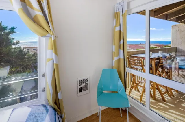 a view of a patio with wooden floor