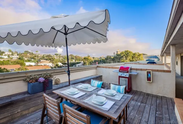 an aerial view of residential building and ocean