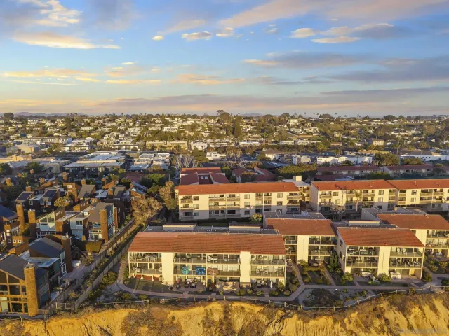 an aerial view of beach and ocean