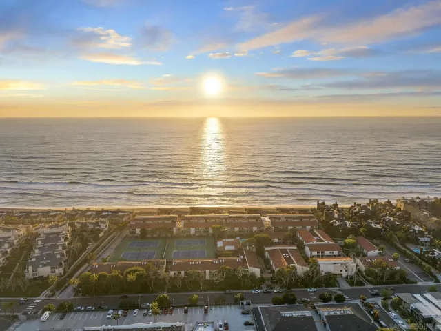 a living room with fireplace furniture and a flat screen tv