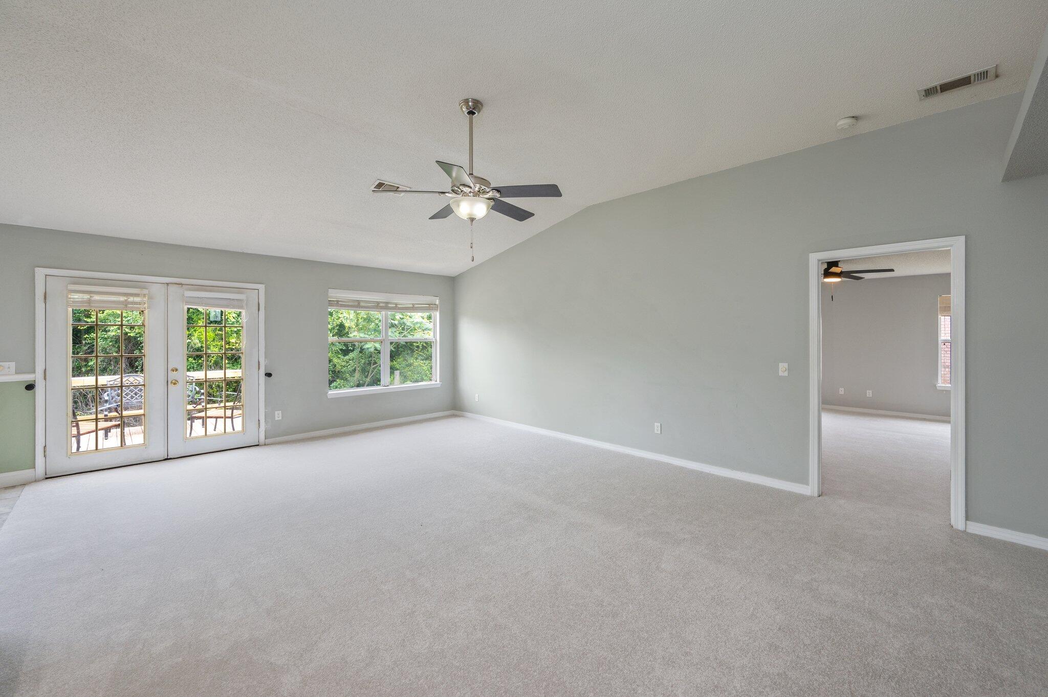 488 Jillian Drive Crestview, FL 32536 - Photo 12 of 29 a view of a livingroom with a ceiling fan and window