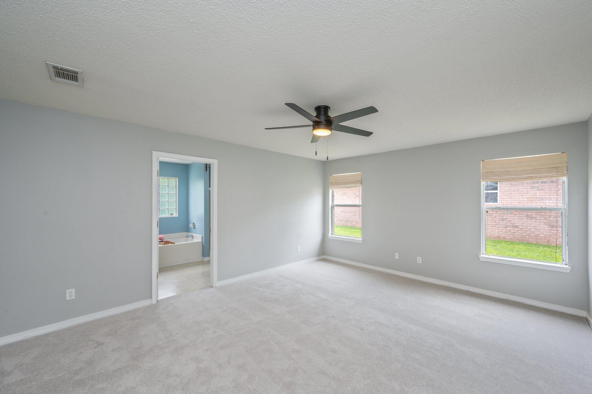 488 Jillian Drive Crestview, FL 32536 - Photo 17 of 29 a view of an empty room with a window