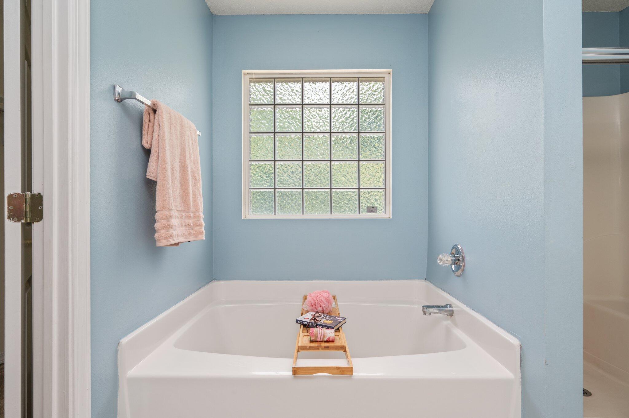 488 Jillian Drive Crestview, FL 32536 - Photo 24 of 29 a white bath tub sitting next to a window