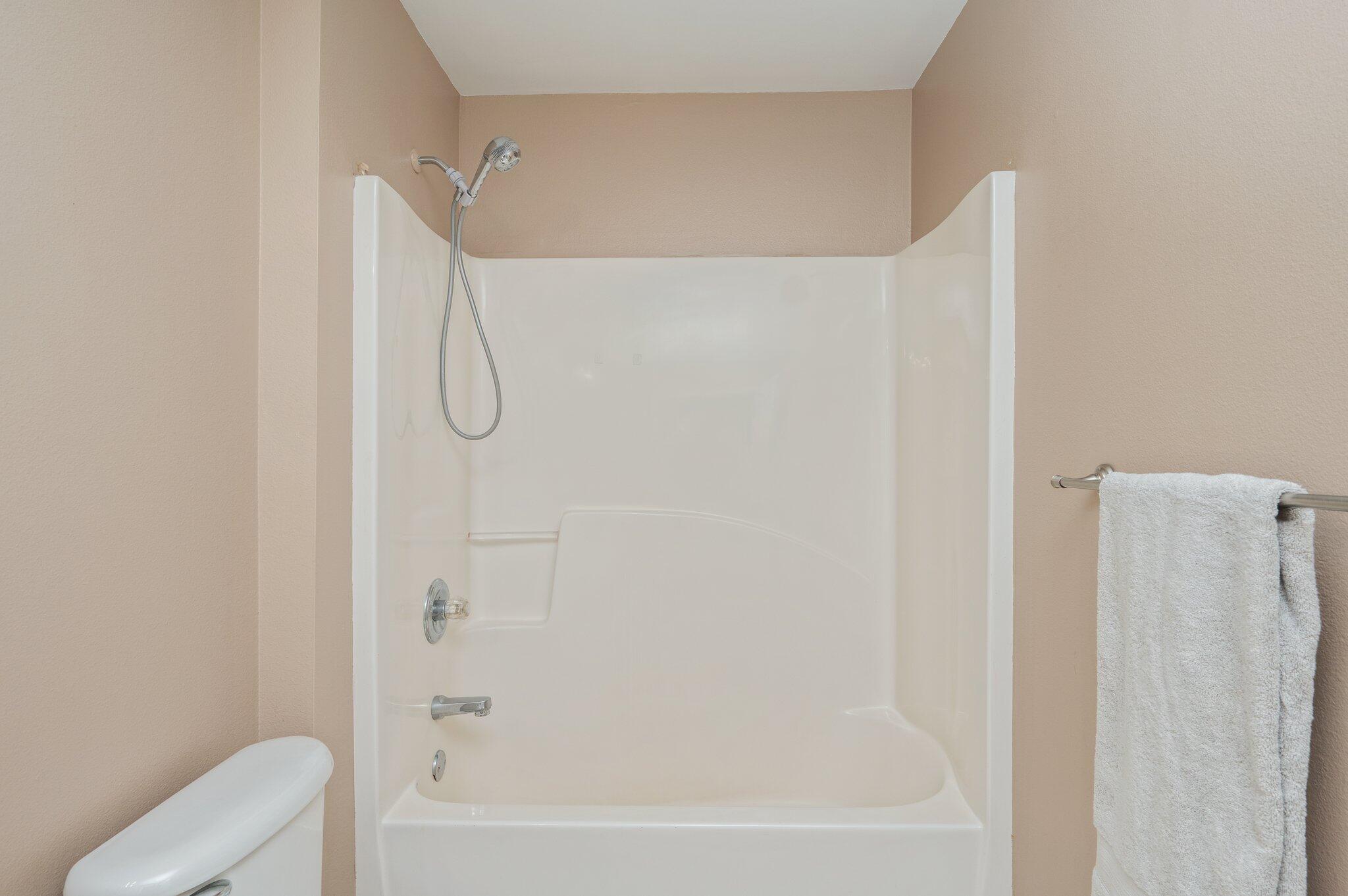 488 Jillian Drive Crestview, FL 32536 - Photo 27 of 29 a bathroom with a bathtub and a shower